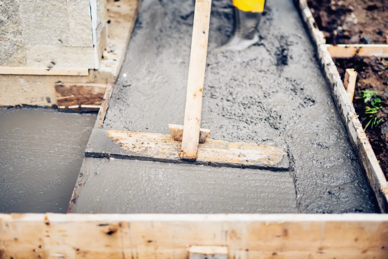 Concrete crew pouring driveway at a New York home