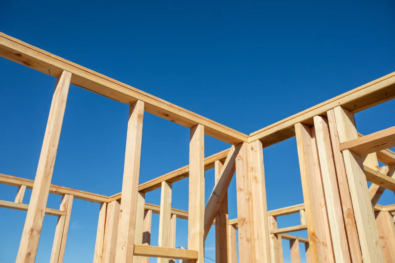 Framing crew building wood structure on a New York job site
