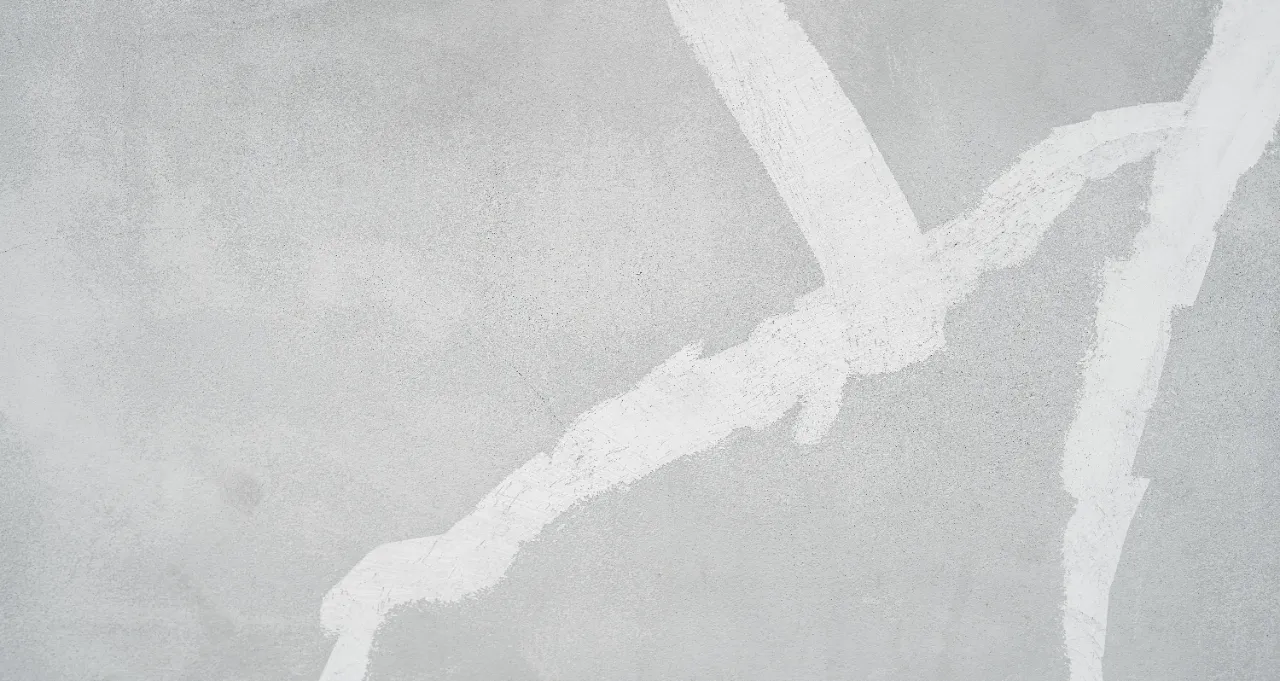 Drywall crack repair on a New York home wall